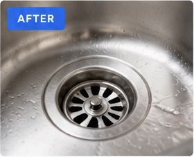 After drain cleaning: a clean stainless-steel sink drain
